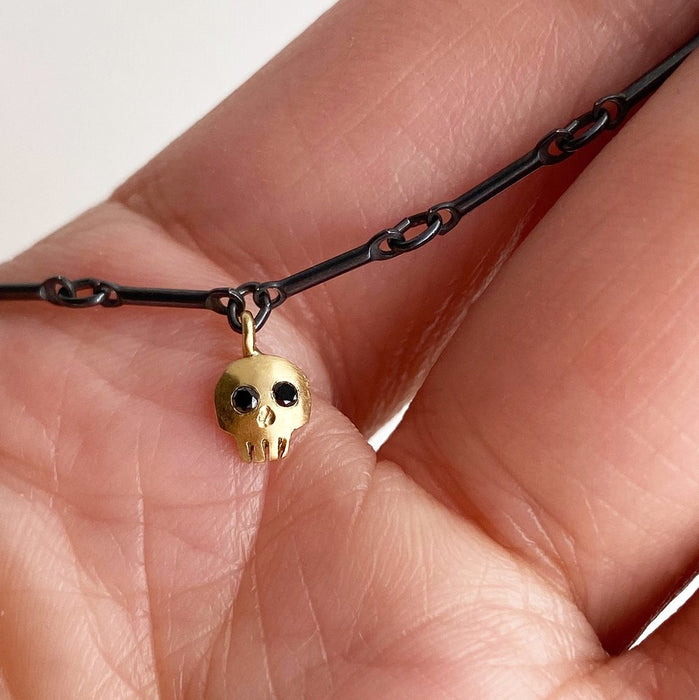 Skull Necklace with Black Diamond Eyes